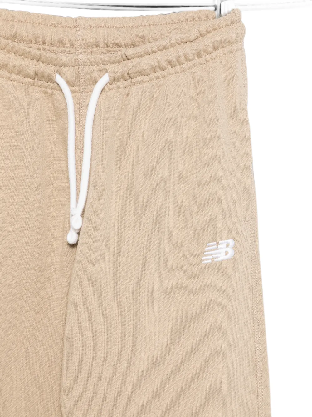 New Balance Kids Trainingsbroek met geborduurd logo Beige