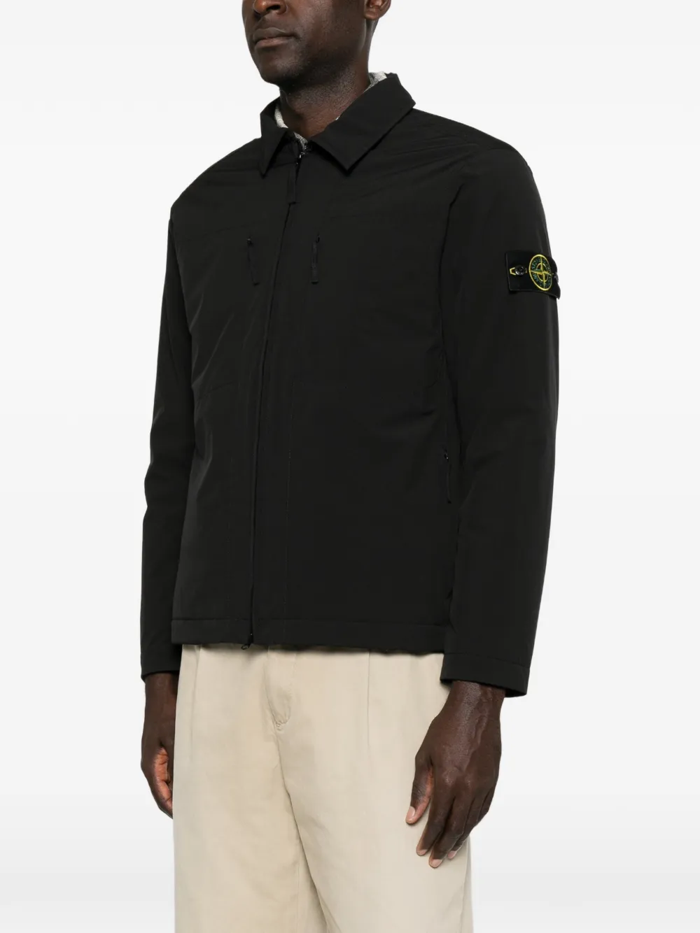 Stone Island logo-patch zip-up jacket Zwart