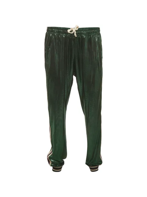 Gucci Pre-Owned pants laminados con logo