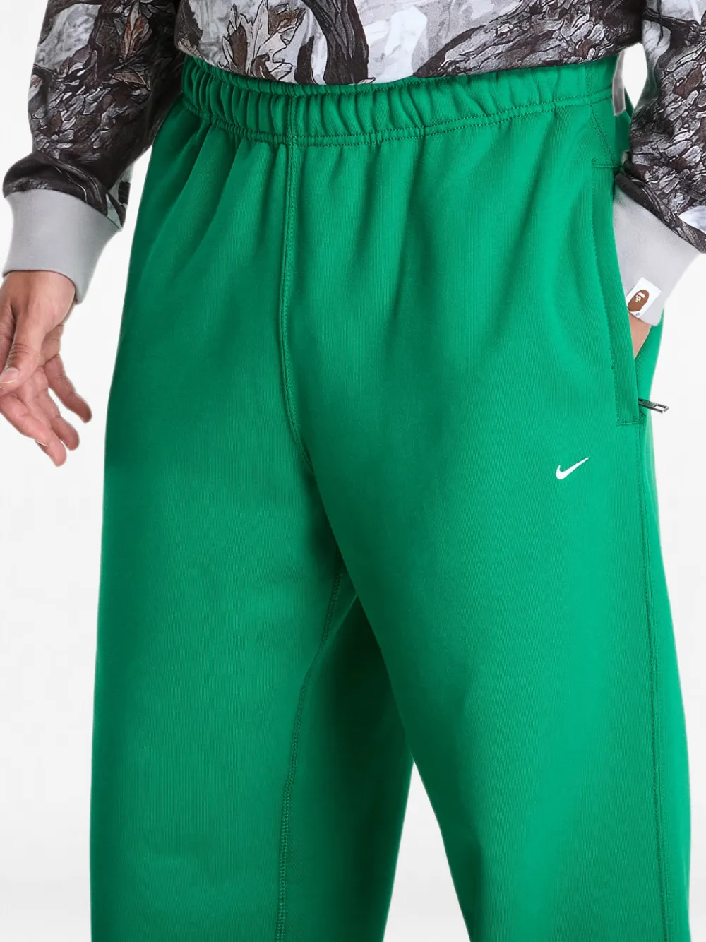 Nike Solo Swoosh track pants Groen