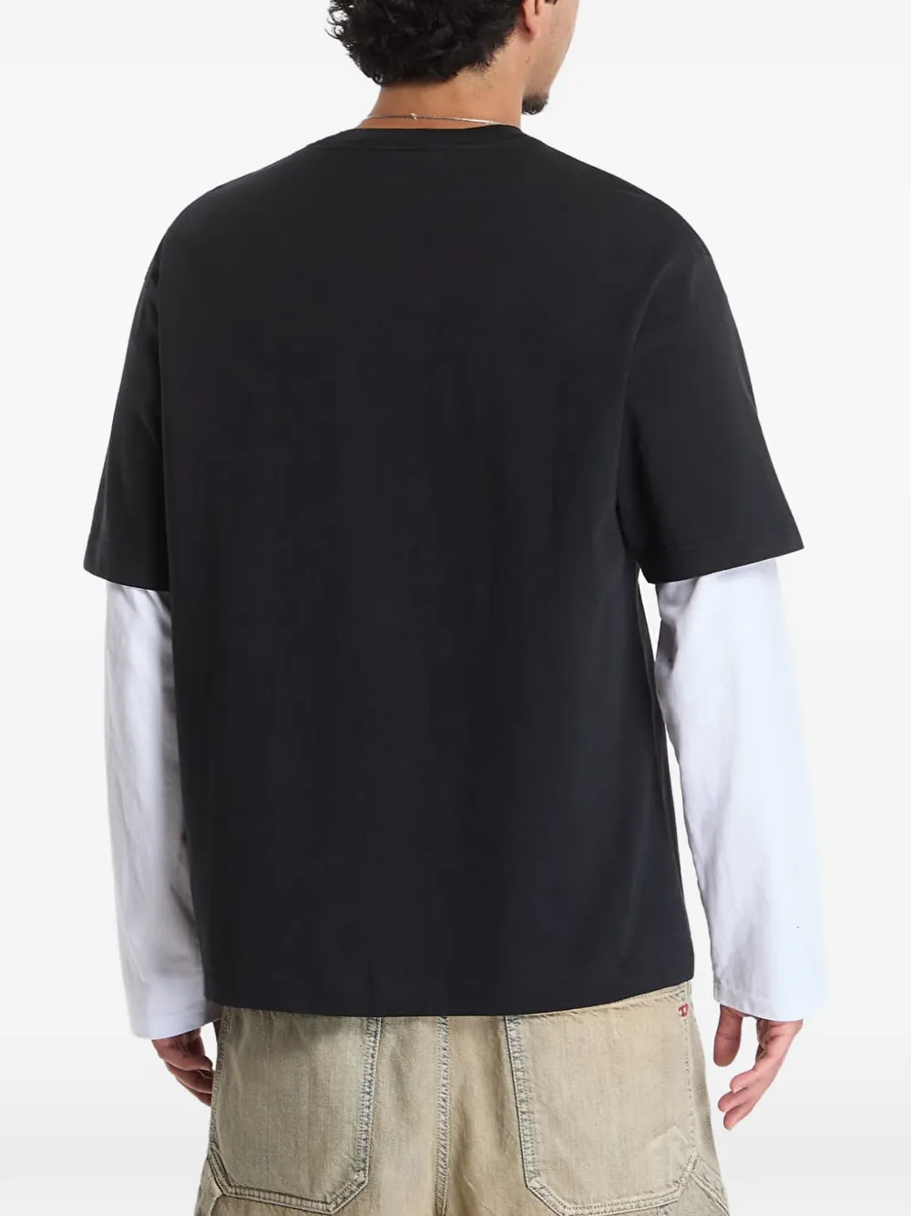 Nike Sportswear Good vs Evil graphic-print T-shirt Zwart