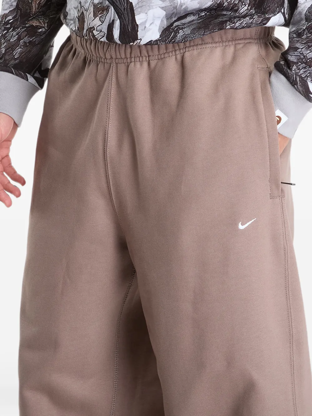 Nike Solo Swoosh embroidered track pants Bruin