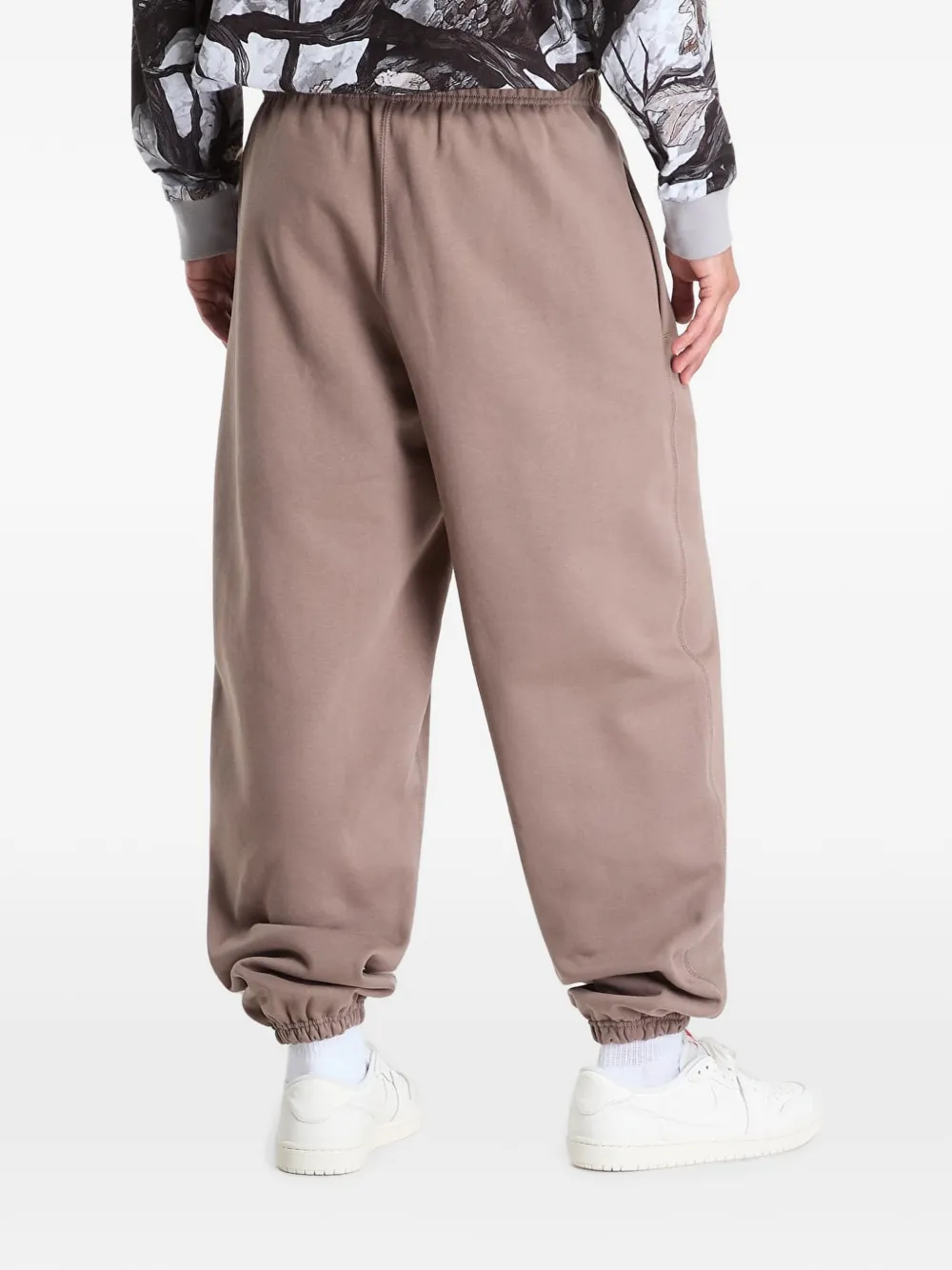 Nike Solo Swoosh embroidered track pants Bruin