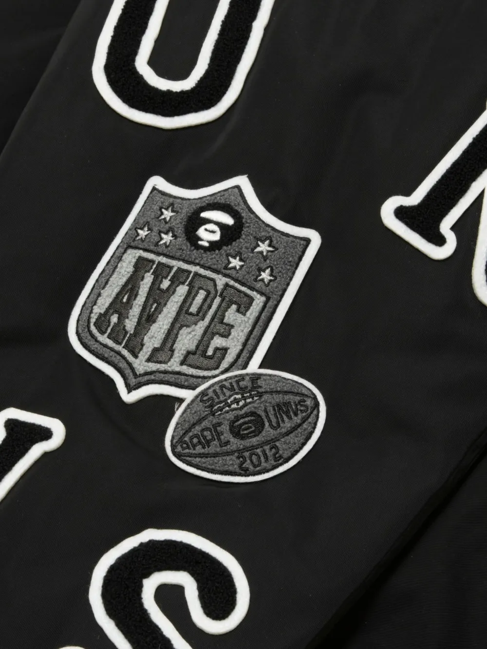 AAPE BY *A BATHING APE Moonface bomberjack met geborduurde patch Zwart