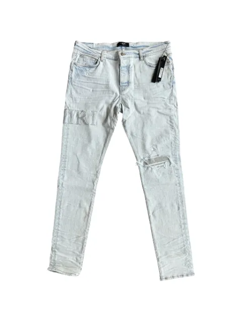 AMIRI crystal-applique logo jeans