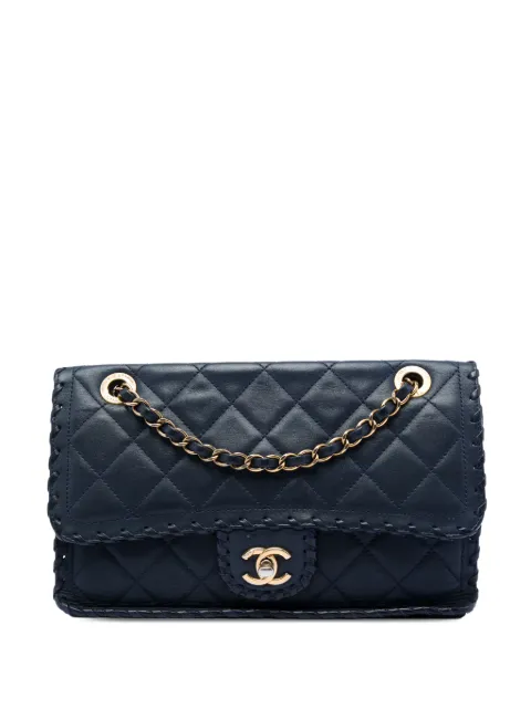 CHANEL Pre-Owned bolsa crossbody Happy mediana de piel de becerro capitonada con costura en la solapa 2014-2015