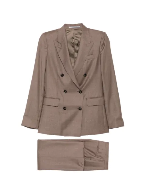 Tagliatore traje con doble botonadura