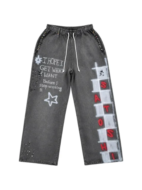 SATOSHI NAKAMOTO Get What I Want distressed graffiti-print trousers