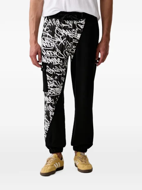 Sprayground graffiti-print cargo-pocket track pants