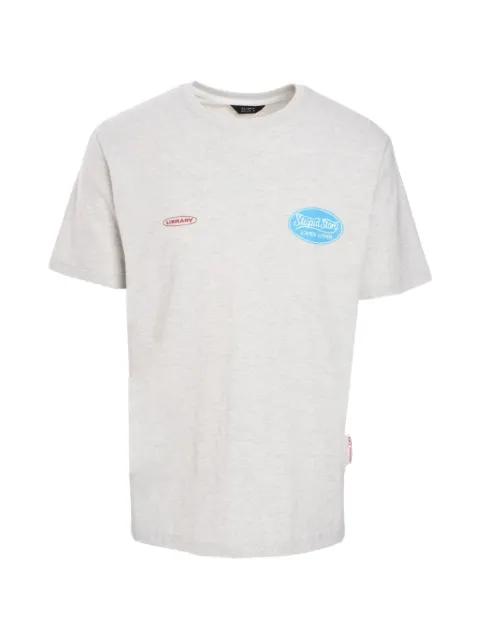 Tee Library Stupid Story logo-print T-shirt