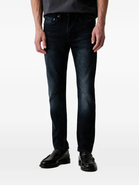Levi's 515 logo-patch jeans