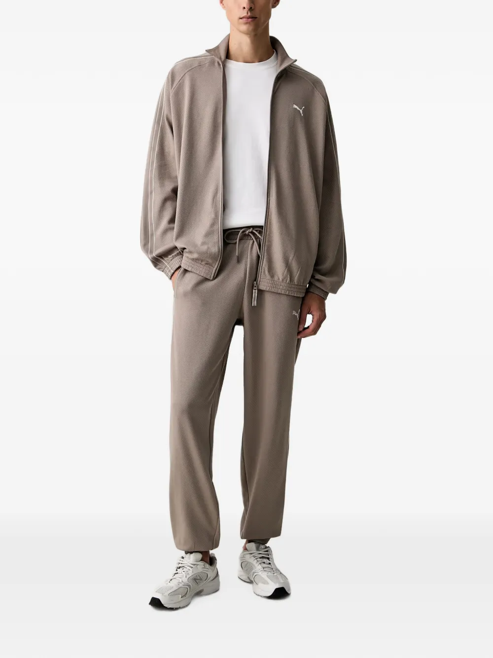 PUMA Trainingsbroek met geborduurd logo Beige