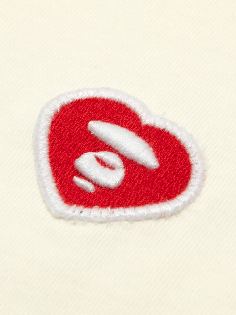 AAPE BY *A BATHING APE AAPENOW T-shirt met raglan mouwen en hartpatch Roze