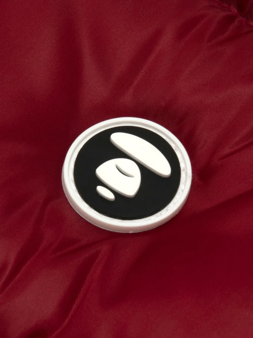 AAPE BY *A BATHING APE Moonface gewatteerde bodywarmer met logo-patch Rood
