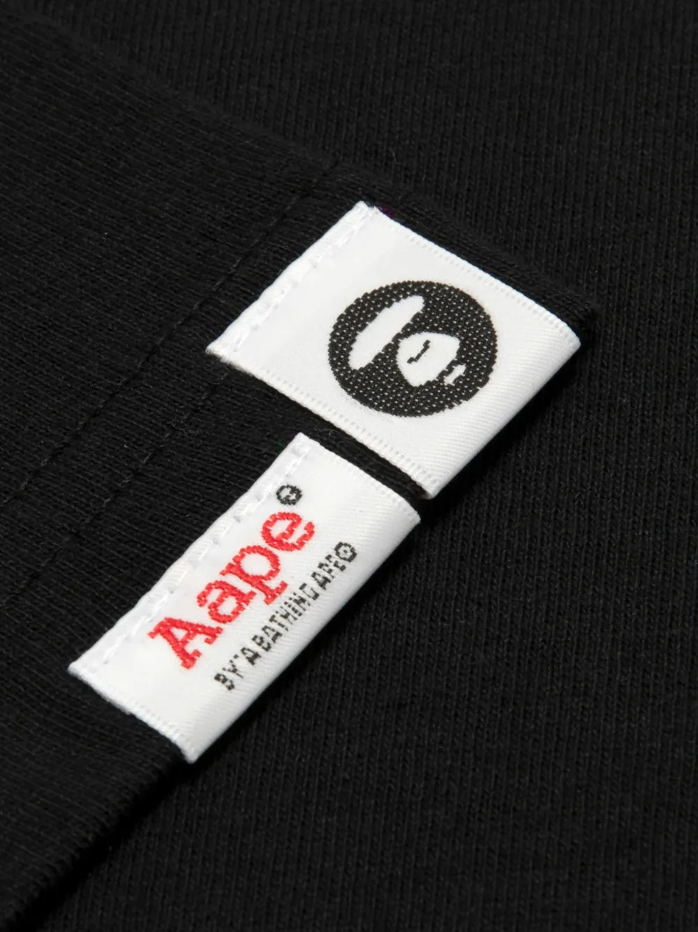 AAPE BY *A BATHING APE AAPEUNVS Moonface T-shirt met grafische print Zwart