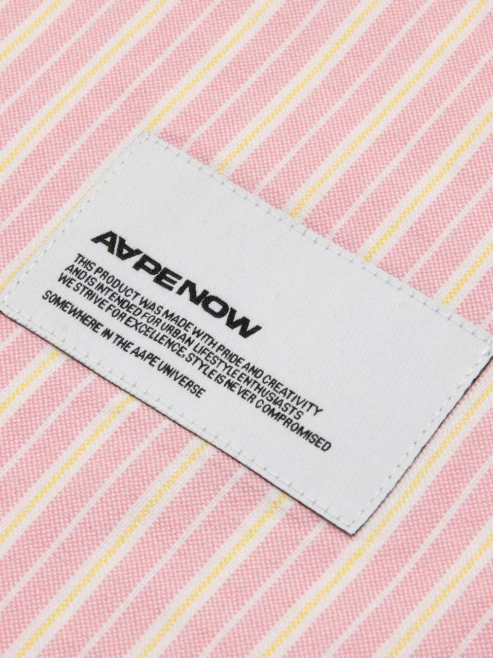 AAPE BY *A BATHING APE Moonface gestreept overhemd met knopen Roze