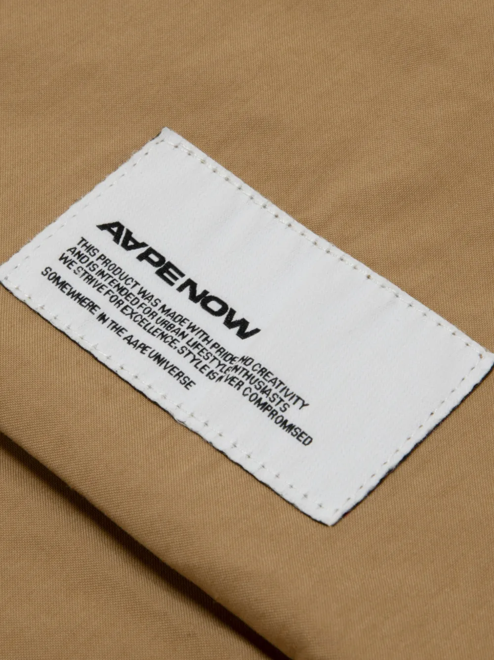 AAPE BY *A BATHING APE Cargo broek met logopatch Beige