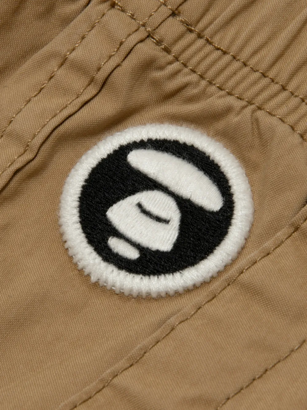 AAPE BY *A BATHING APE Cargo broek met logopatch Beige