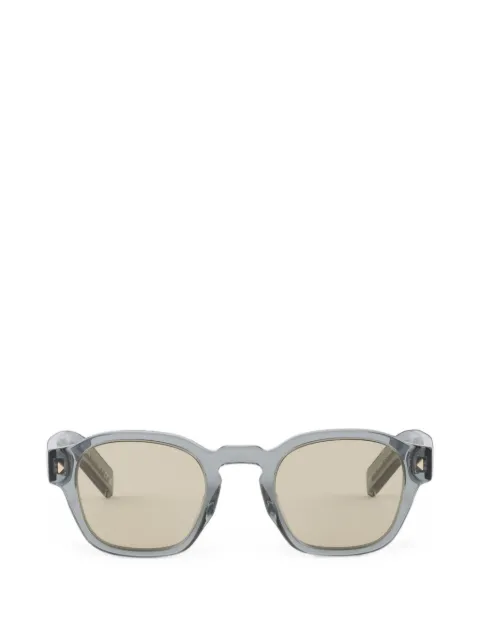 Prada Eyewear sunglasses with the iconic metal plaque