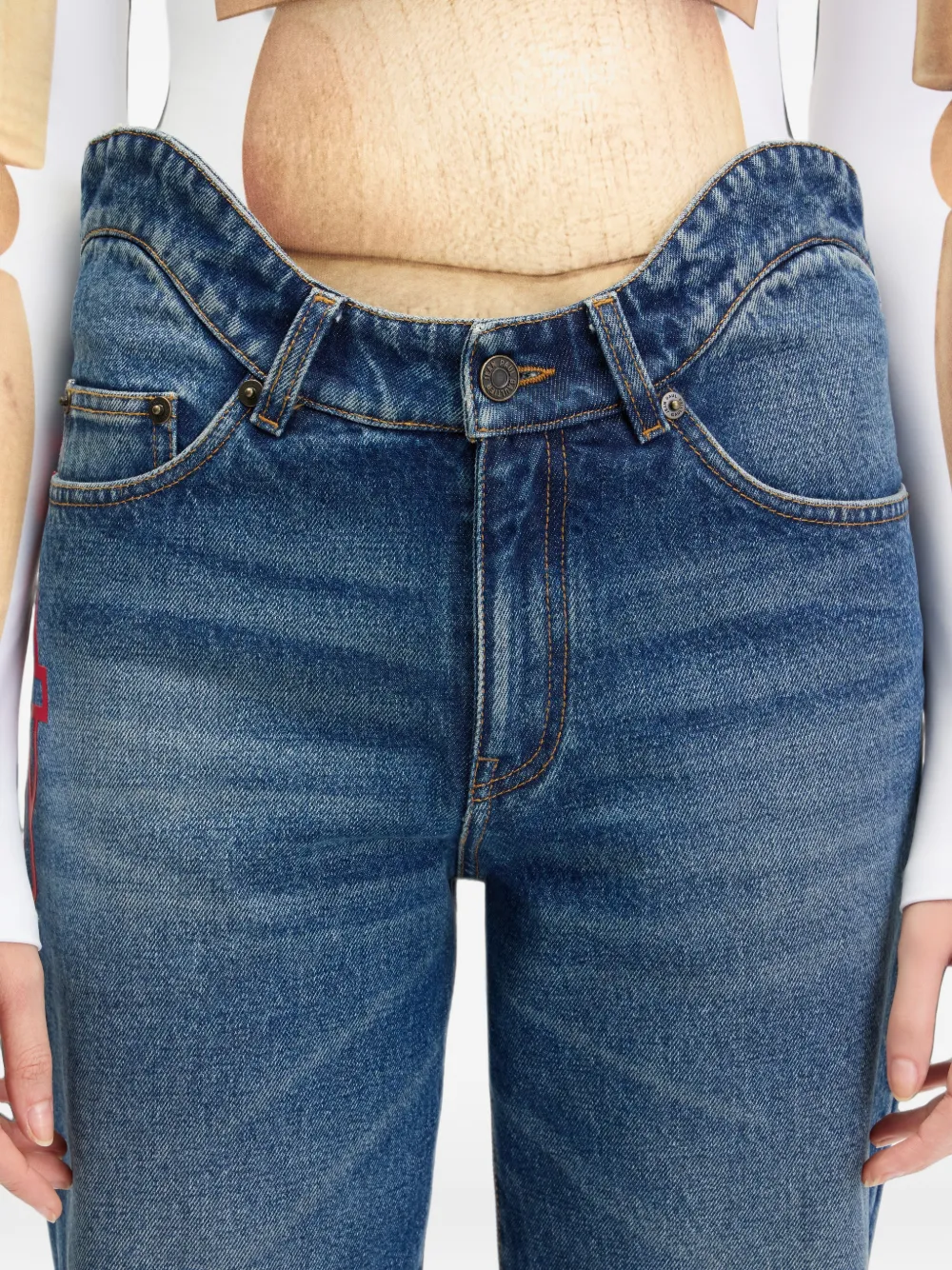 Jean Paul Gaultier The Curved JPG denim broek. Blauw