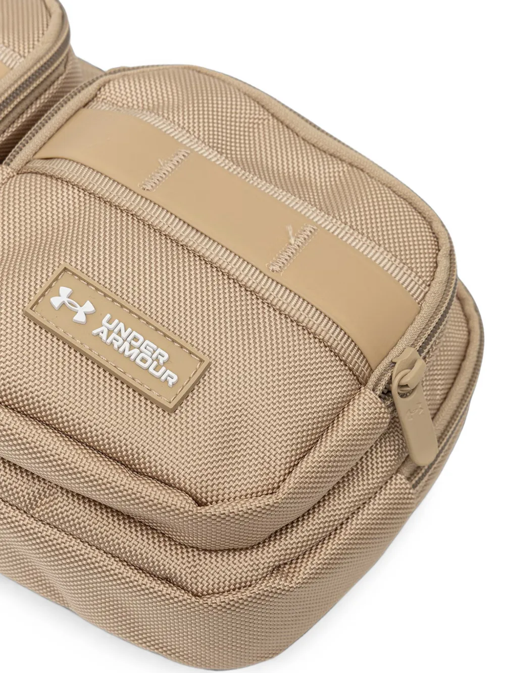 Under Armour Triumph heuptas met meerdere zakken Beige