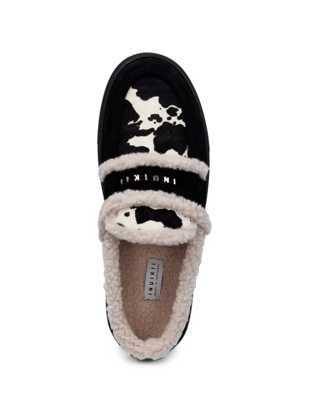 Inuikii shearling-trim cow-print loafers Zwart