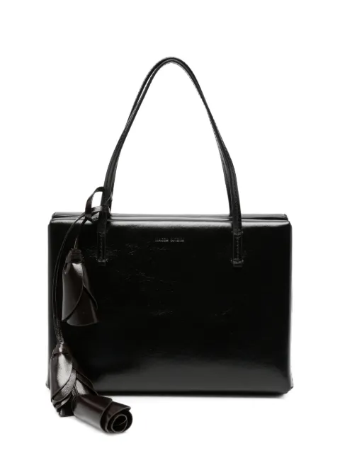 Magda Butrym tote de piel con dije floral