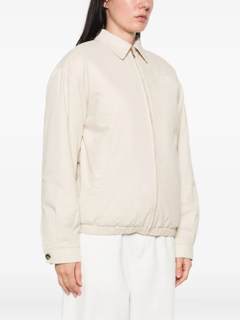 Miu Jack met geborduurd logo en rits Beige