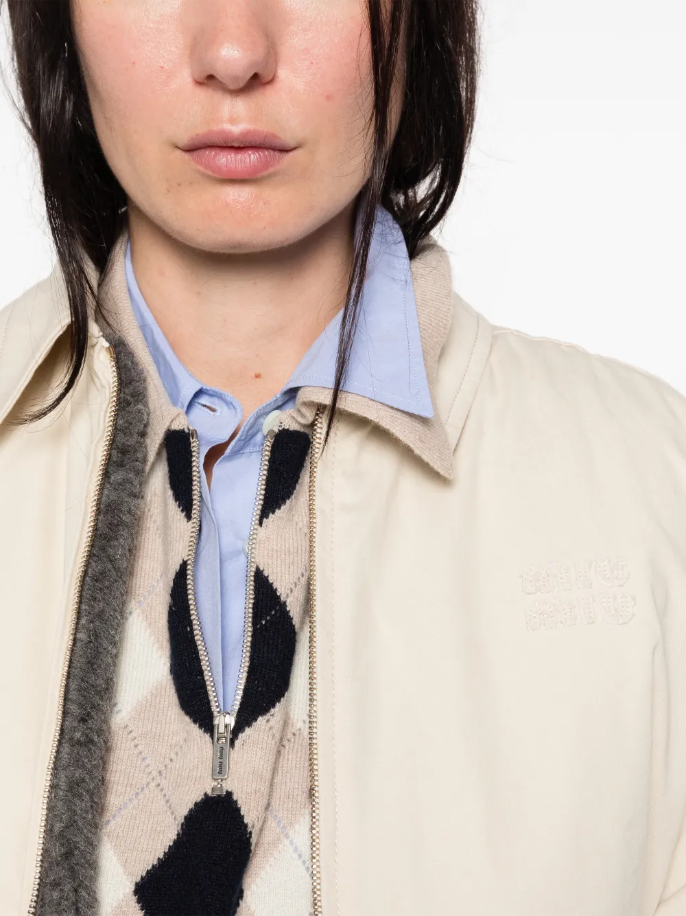 Miu Jack met geborduurd logo en rits Beige