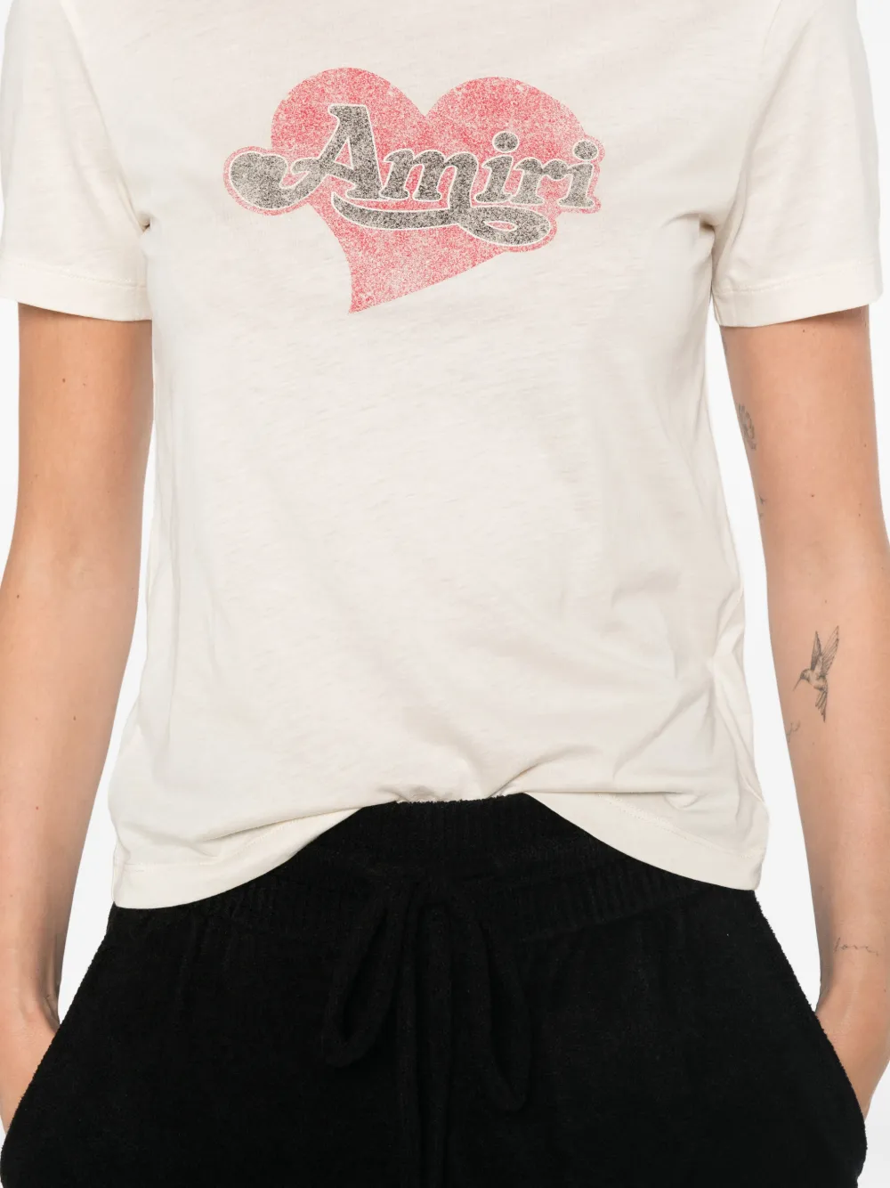 AMIRI T-shirt met logoprint Beige