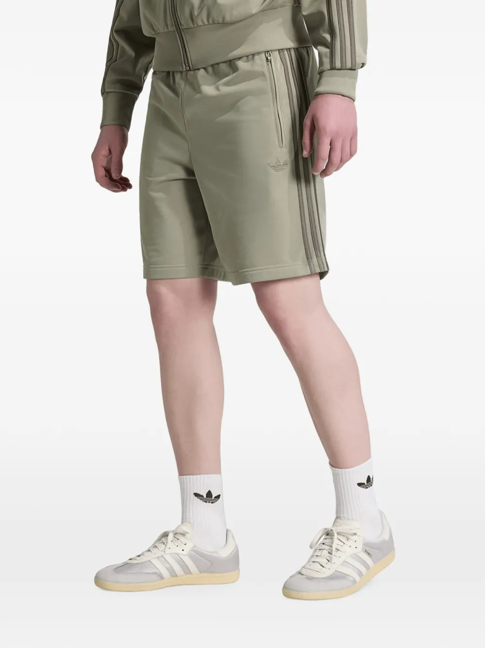 adidas Firebird side-stripe shorts Groen