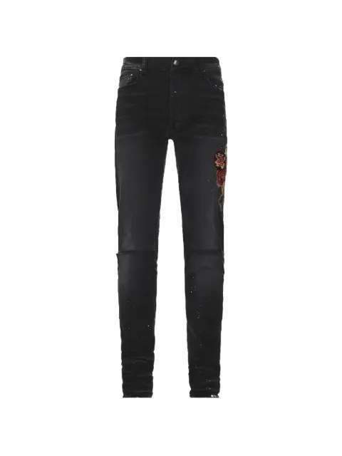 AMIRI patch-detail distressed jeans