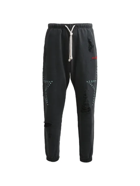 SATOSHI NAKAMOTO distressed star-studded track pants