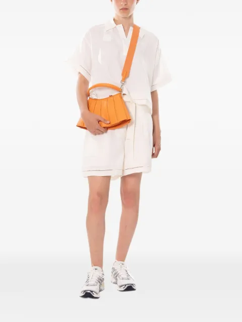 Lacoste bandolera Runway Lenglen pequeña con pliegues