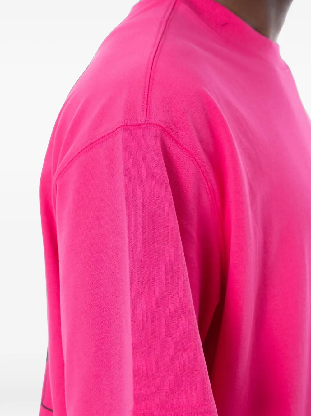 SONGZIO x ASSC T-shirt met logo-print Roze