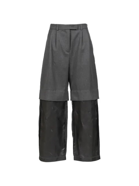 Vaquera pantalones Chopped de dos capas