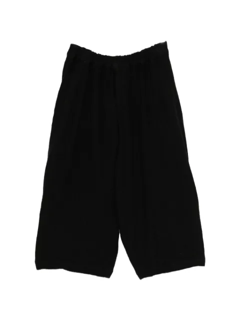 Black Comme Des Garçons elasticated cropped trousers