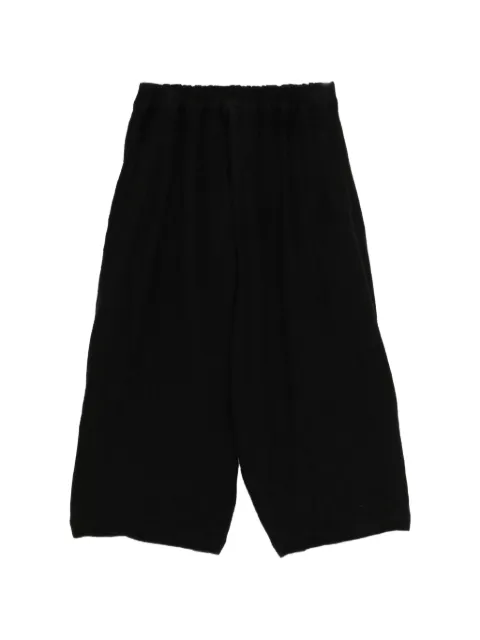 Black Comme Des Garçons elasticated cropped trousers