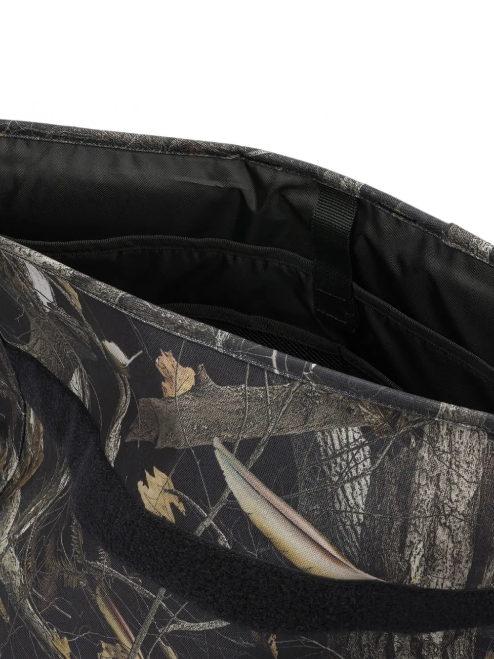 Carhartt WIP Schoudertas met gespsluiting en camouflageprint Zwart
