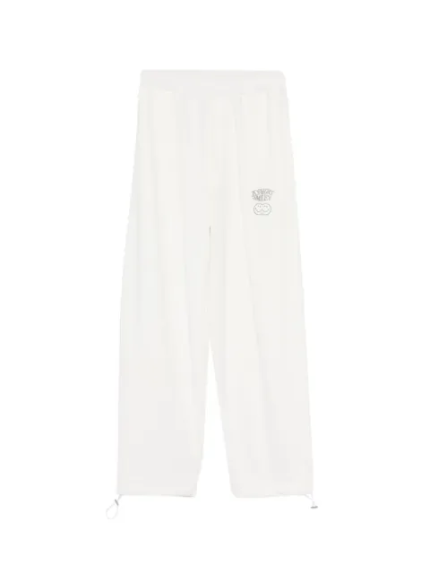 Joshua Sanders over double-smile track pants