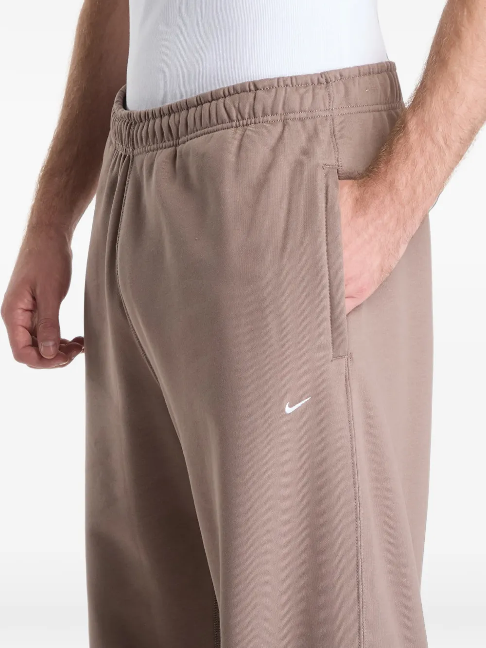 Nike Solo Swoosh track pants Beige