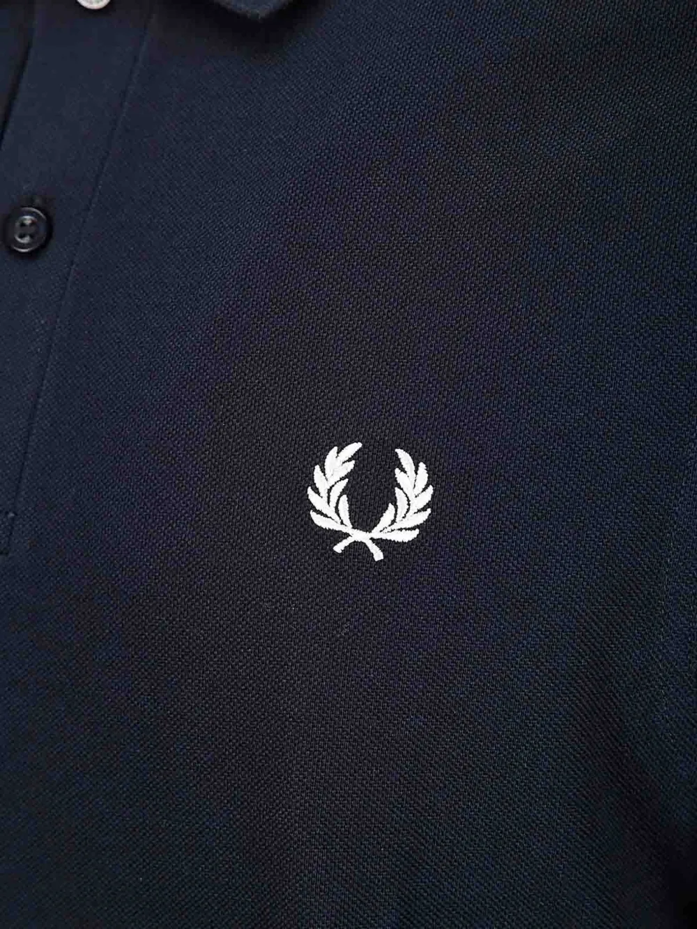 Comme des Garçons Homme Poloshirt met tekst Blauw