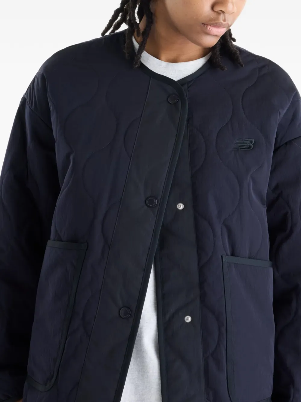 New Balance quilted bomber jacket Blauw