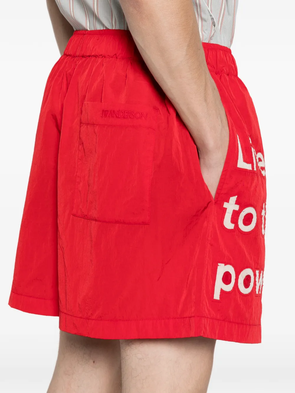 JW Anderson x Guinness slogan track shorts in red Rood
