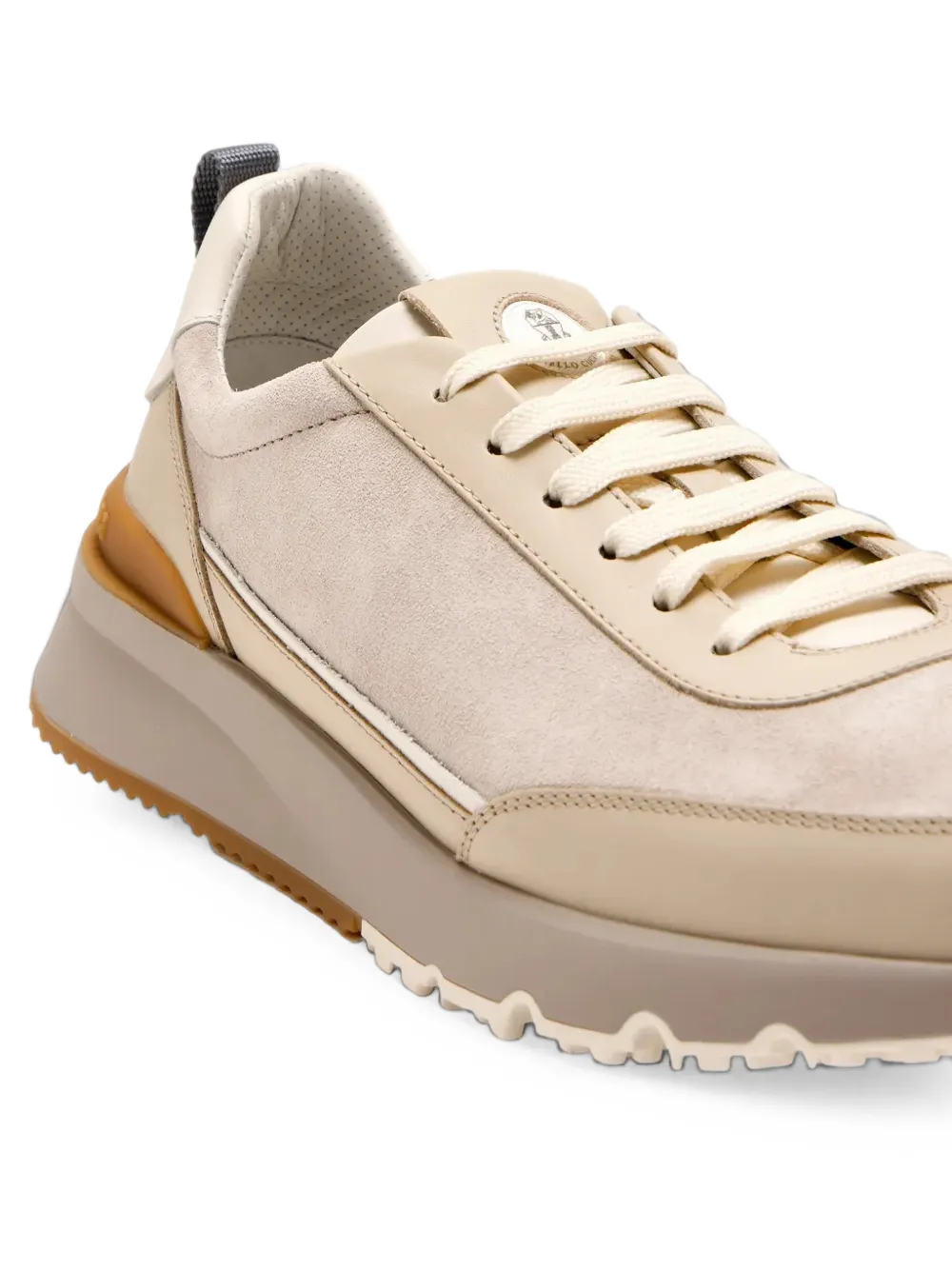 Brunello Cucinelli logo-embossed lace-up sneakers in beige