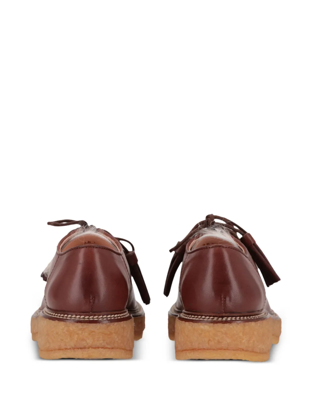 Tod's faux fur-trimmed tasselled loafers Bruin