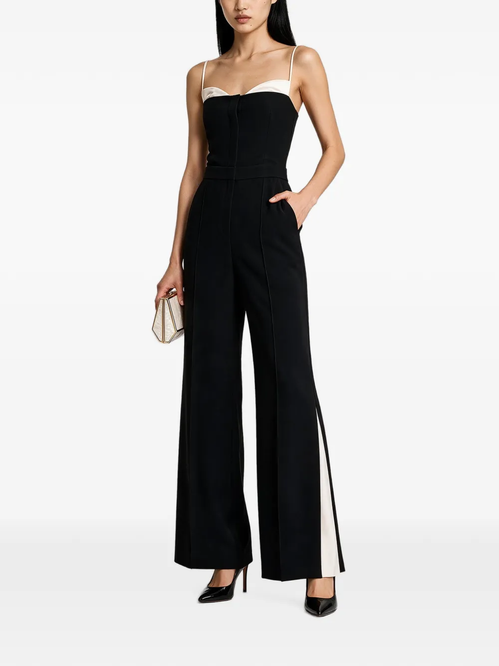 SIMKHAI Mouwloze jumpsuit met contrasterende afwerking Zwart