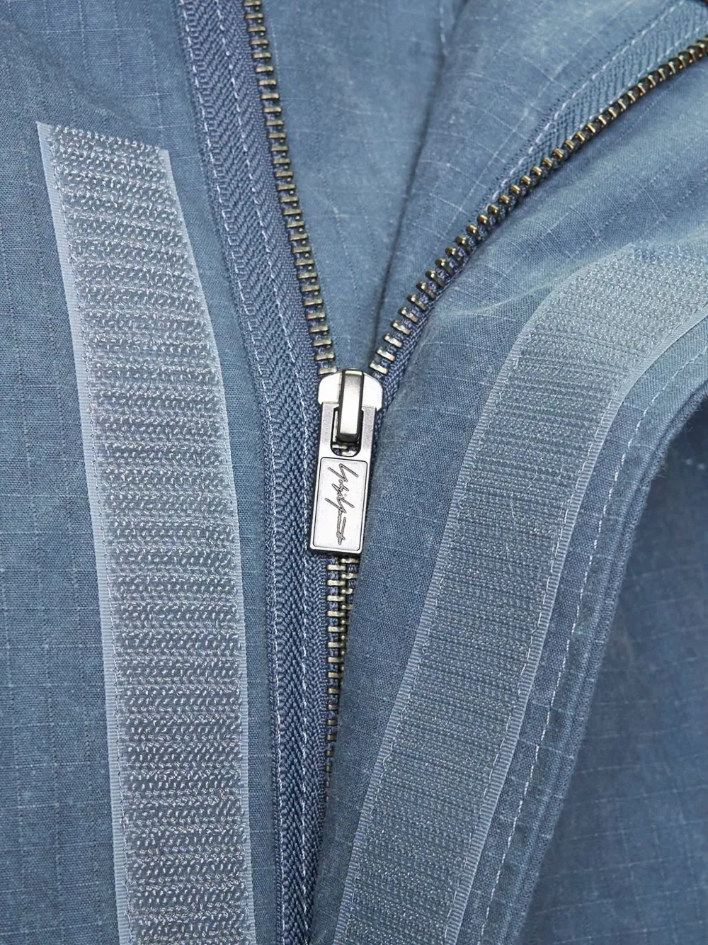 Yohji Yamamoto Ripstop jas met capuchon Blauw