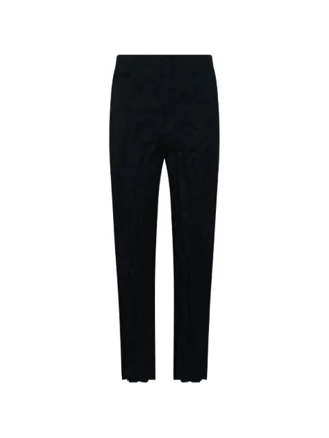 Comme des Garçons Homme pantalones con efecto arrugado