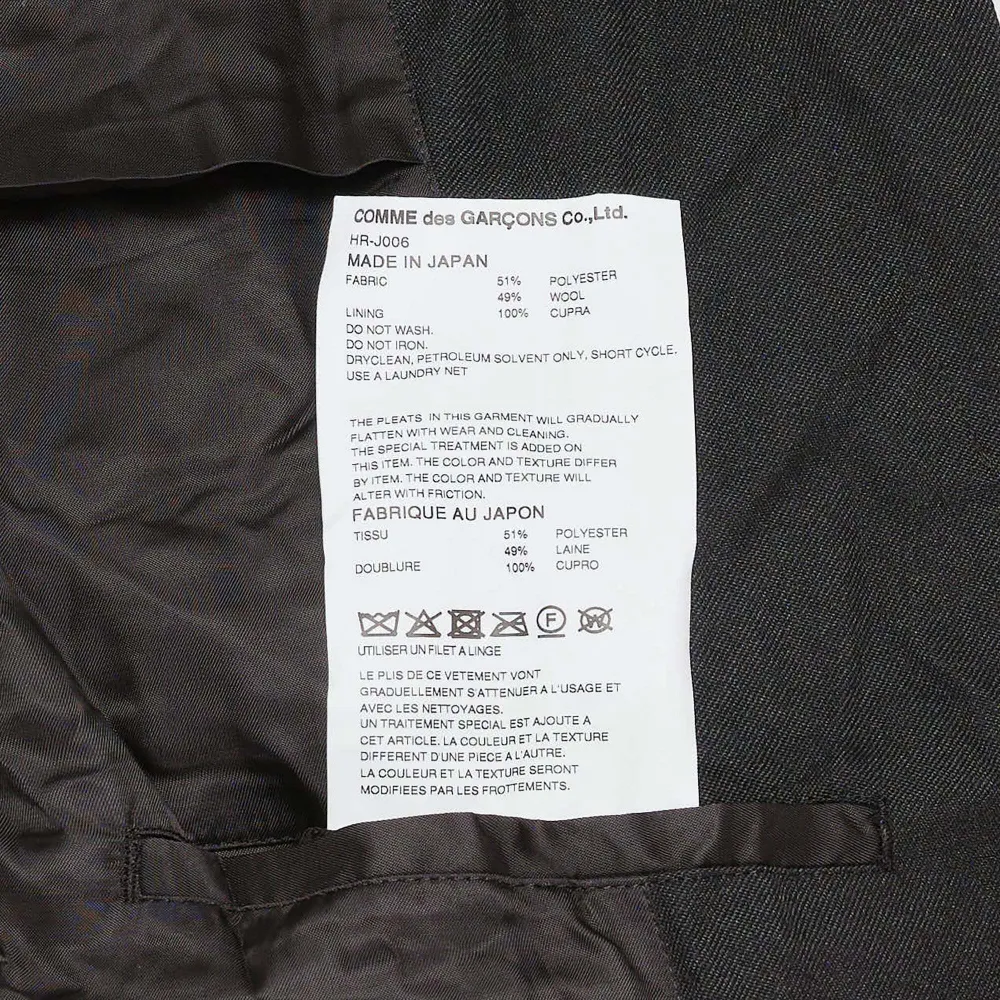 Comme des Garçons Homme Jack met enkele rij knopen en gekreukte afwerking Zwart